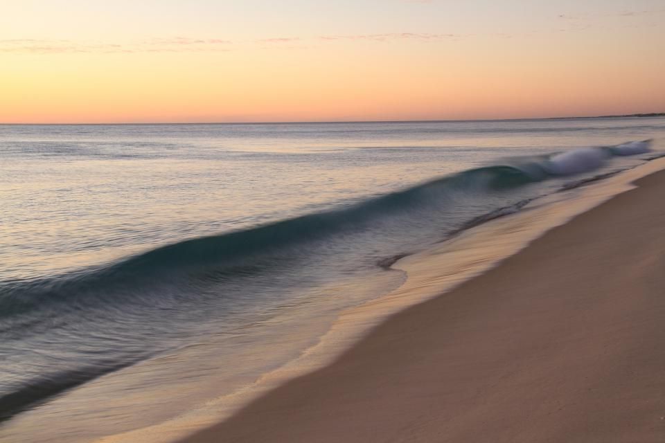 The beach and the water beyond it